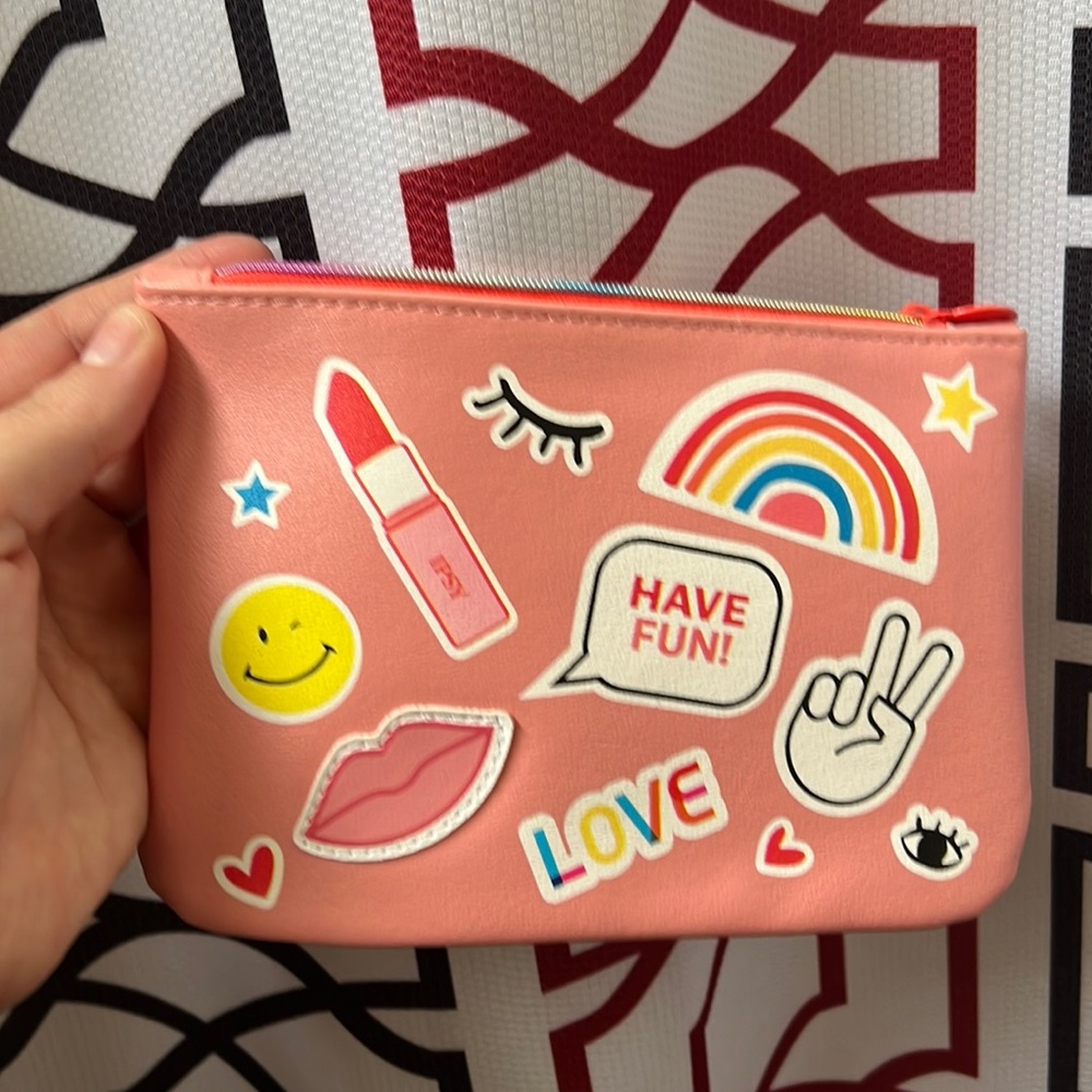 Ipsy zip cosmetic bag or whatever you want to use for